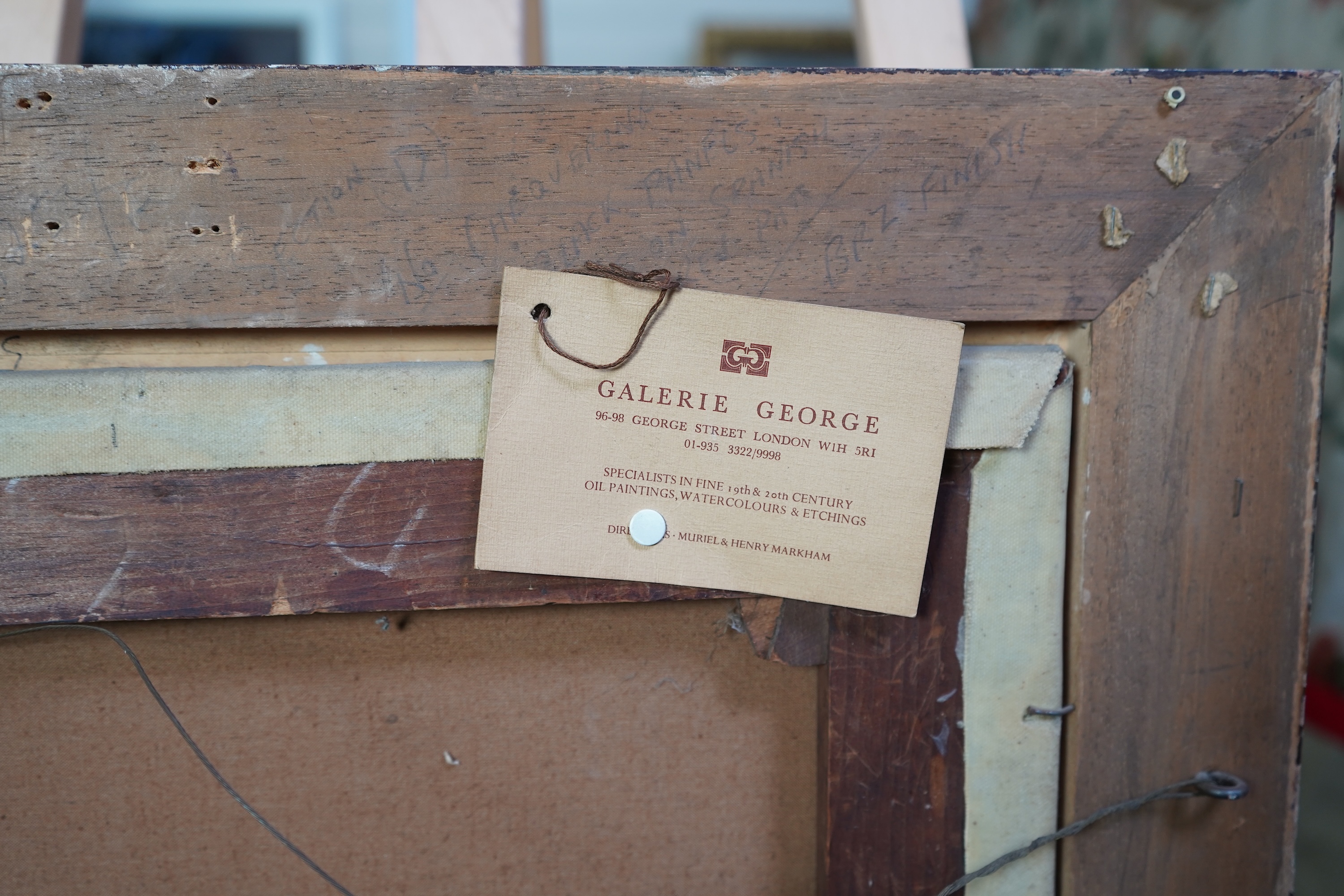 Alfred Holst Tourrier, British 1836-1892, A gentleman wearing Tudor dress seated before an arched window